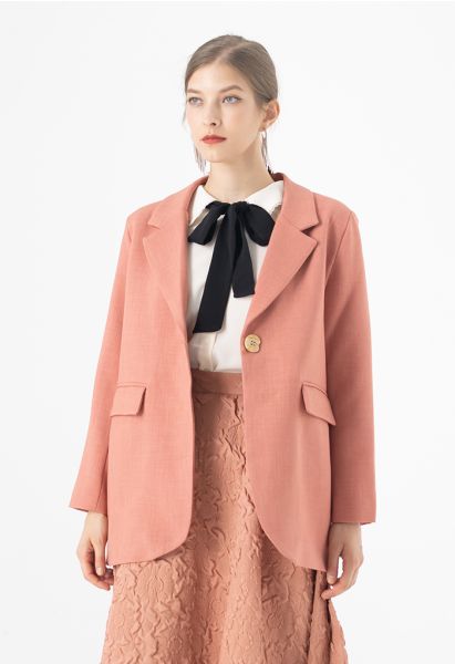 Blazer à simple boutonnage avec épaules rembourrées en corail