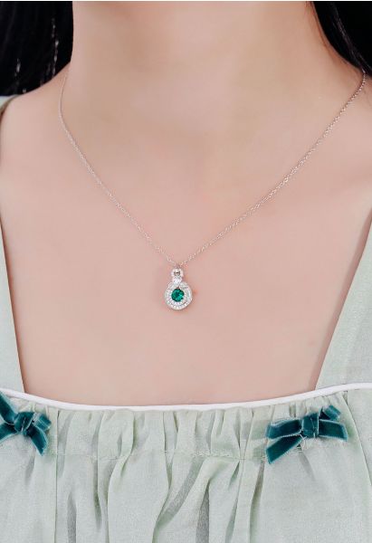 Collier diamant émeraude halo arrondi