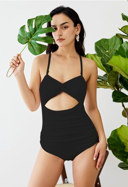 Maillot de bain texturé ondulé à découpe torsadée en noir