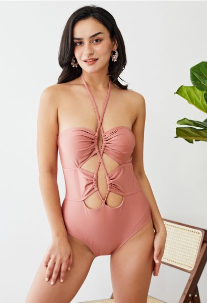 Maillot de bain à découpes croisées et dos nu en rose