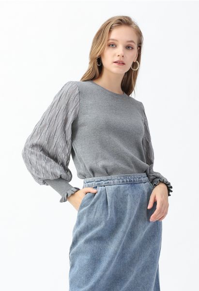 Haut en tricot à manches bouffantes et lignes brillantes en gris