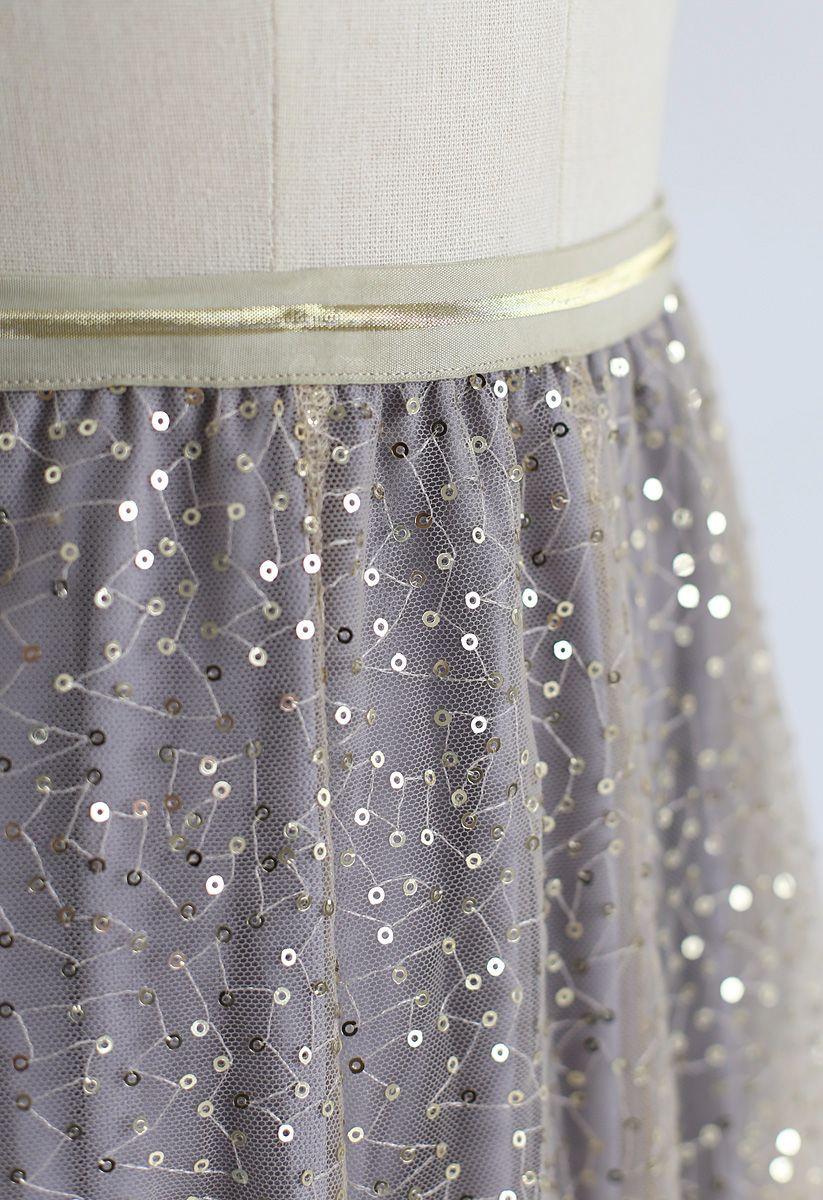 Jupe plissée en tulle brodé de sequins scintillants