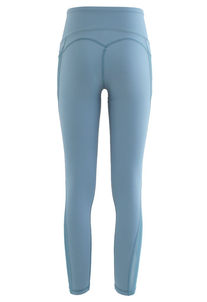 Legging longueur cheville avec poches en filet et taille haute en bleu