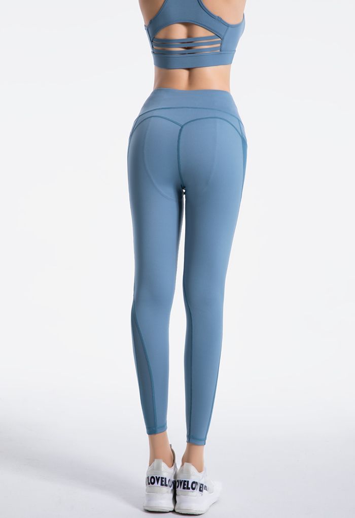 Legging longueur cheville avec poches en filet et taille haute en bleu