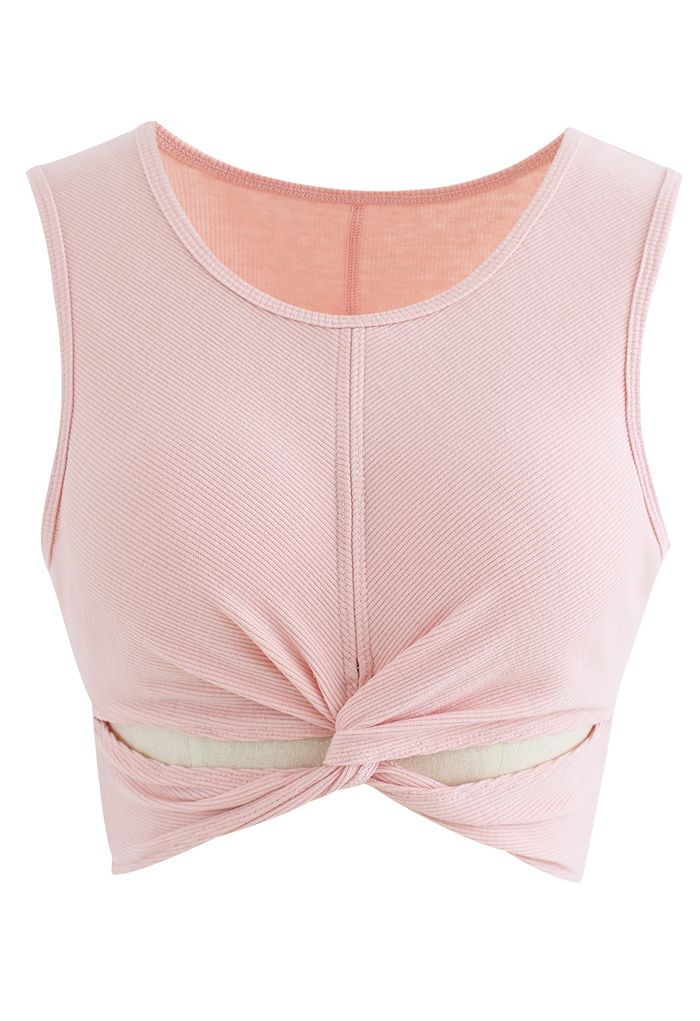 Soutien-gorge de sport côtelé sans manches à faible impact sur le devant torsadé en rose nude