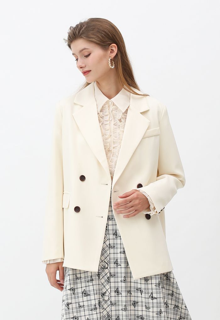 Blazer à double boutonnage avec fausses poches en crème