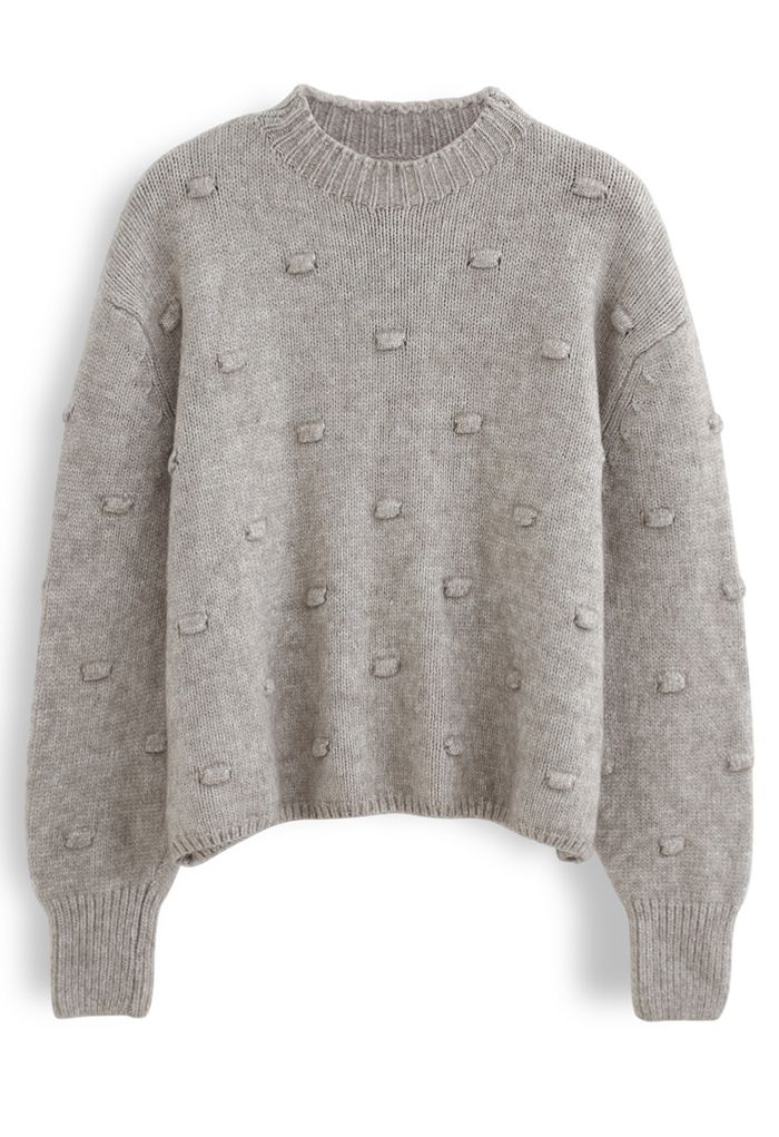 Pull en maille à col montant et pois 3D en taupe