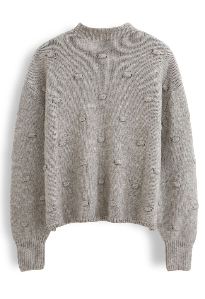 Pull en maille à col montant et pois 3D en taupe