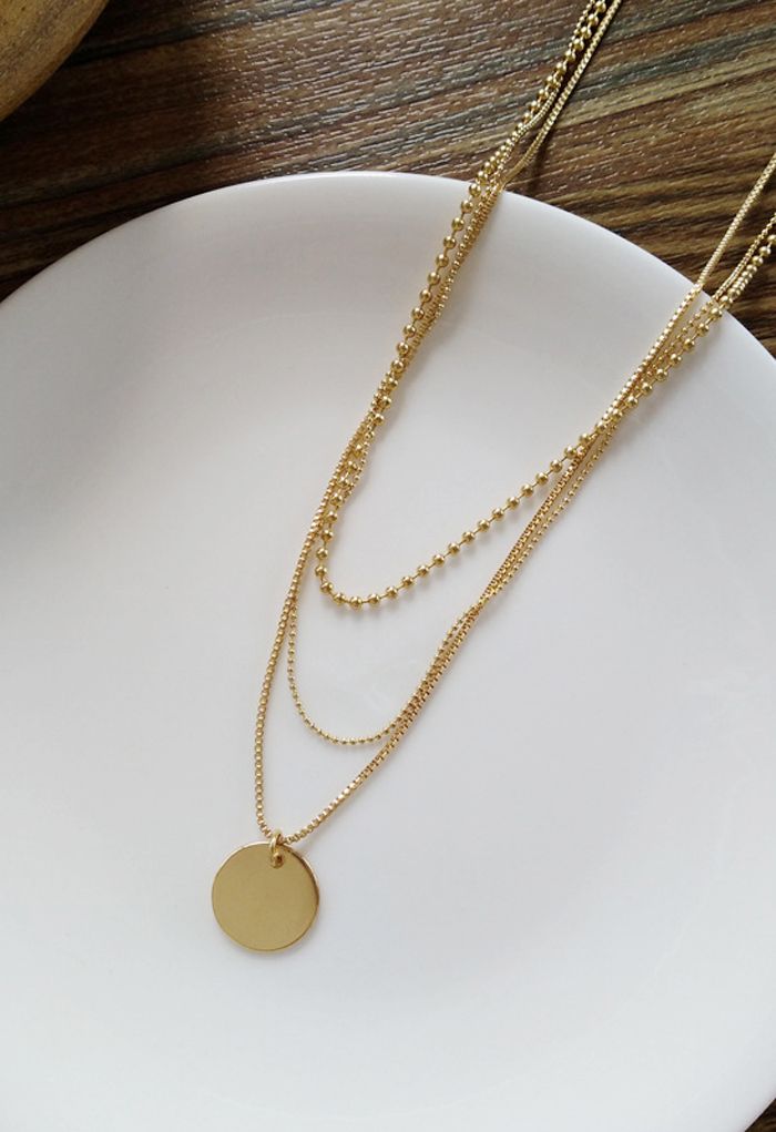 Collier de pièces d'or à trois couches