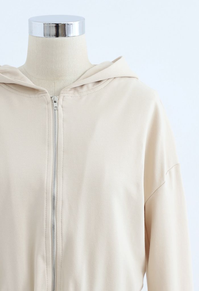 Sweat à capuche zippé et jogging à cordon de serrage en crème