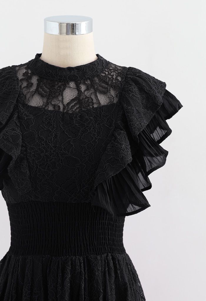 Robe mi-longue en dentelle sans manches à volants en noir