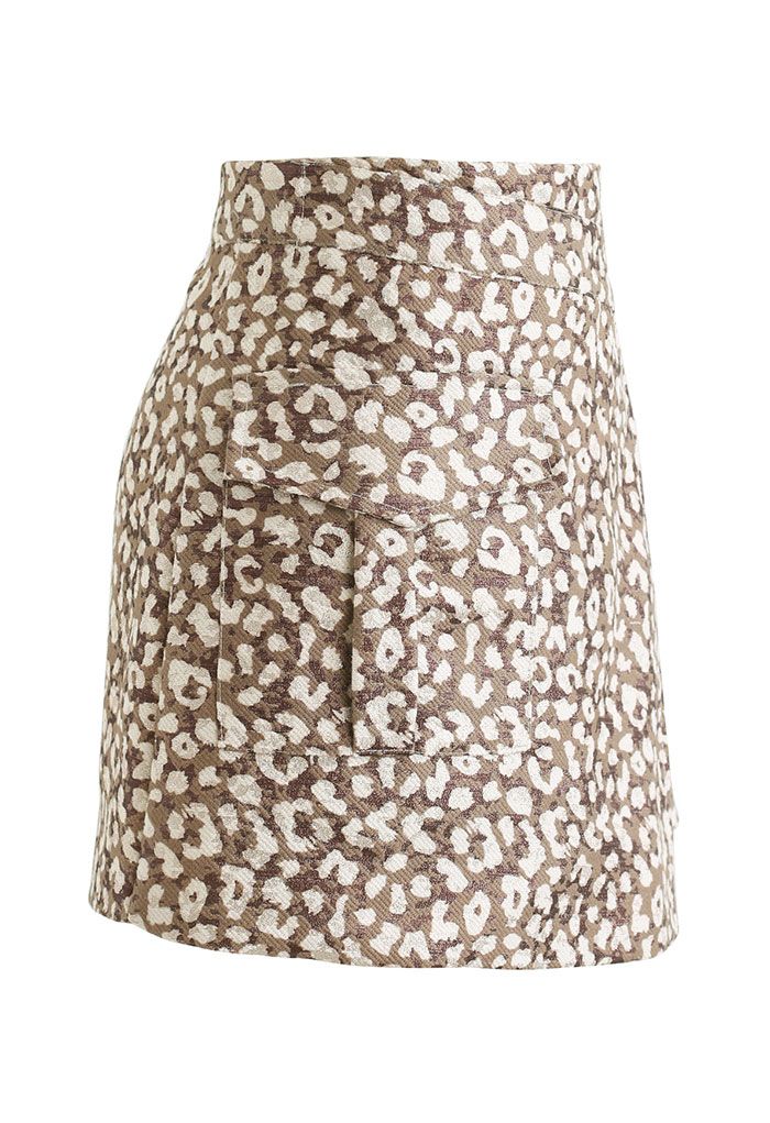 Mini-jupe asymétrique scintillante à motif léopard en marron
