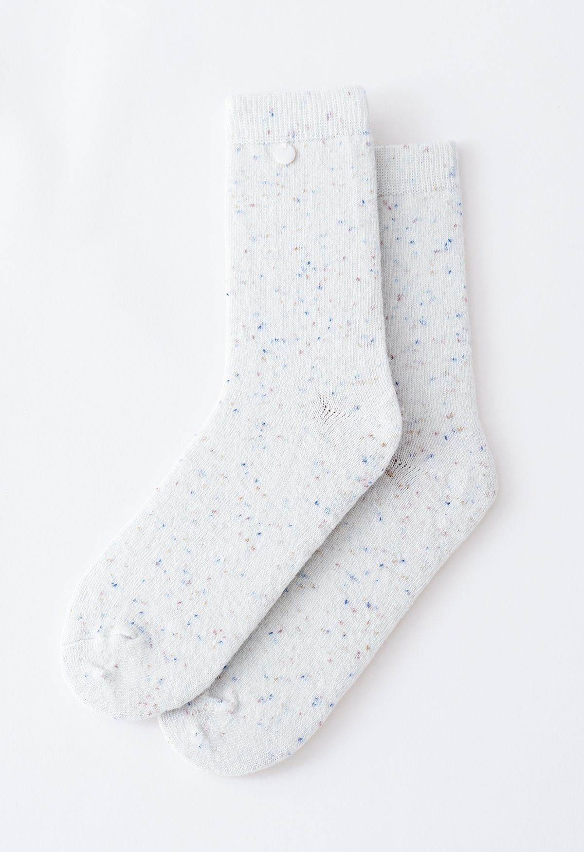 Chaussettes mi-mollet en mélange de laine mélangée à pois en crème