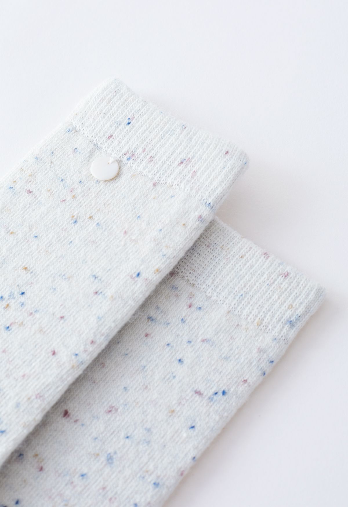 Chaussettes mi-mollet en mélange de laine mélangée à pois en crème