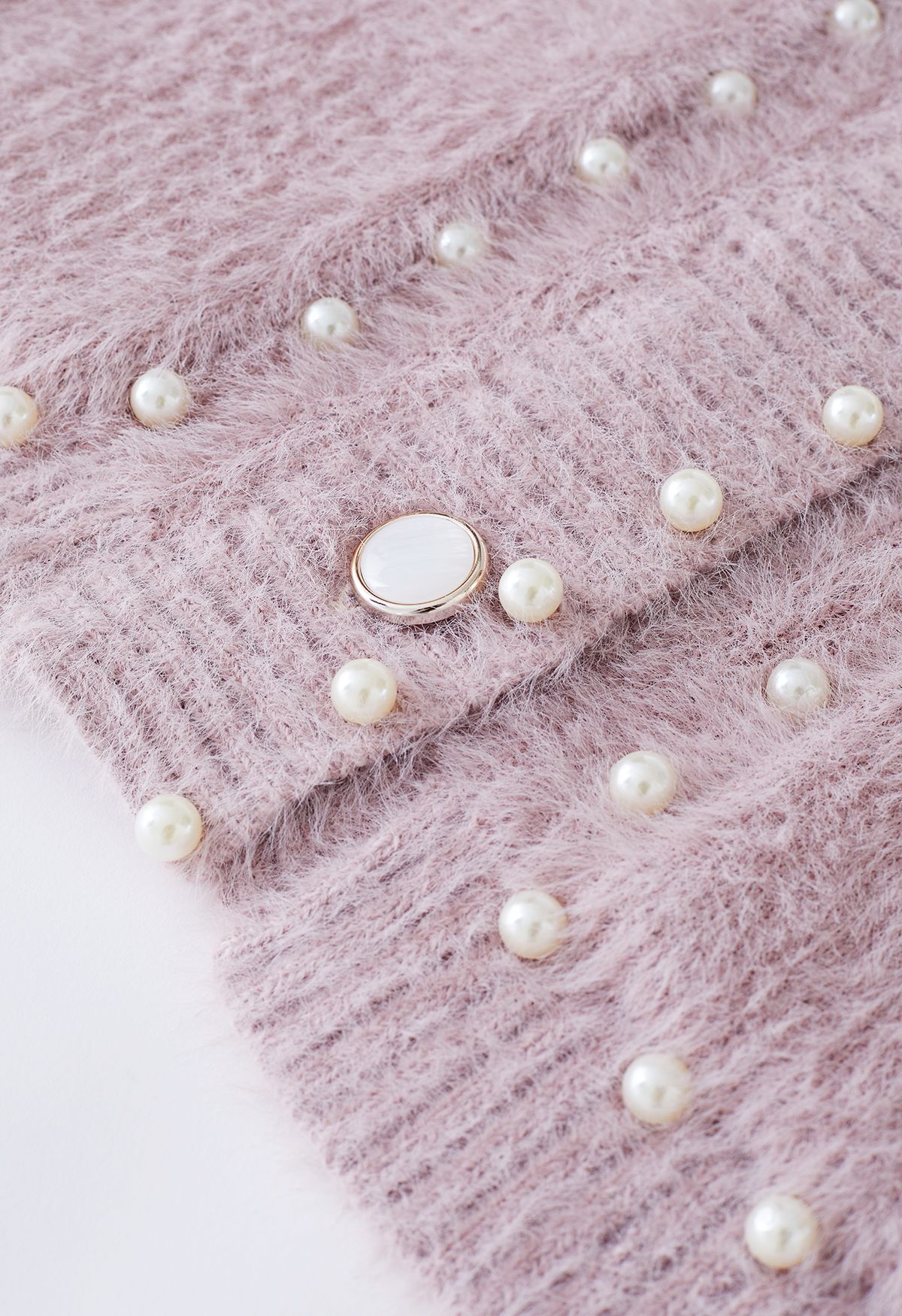 Cardigan en tricot pelucheux avec poches passepoilées en vieux rose