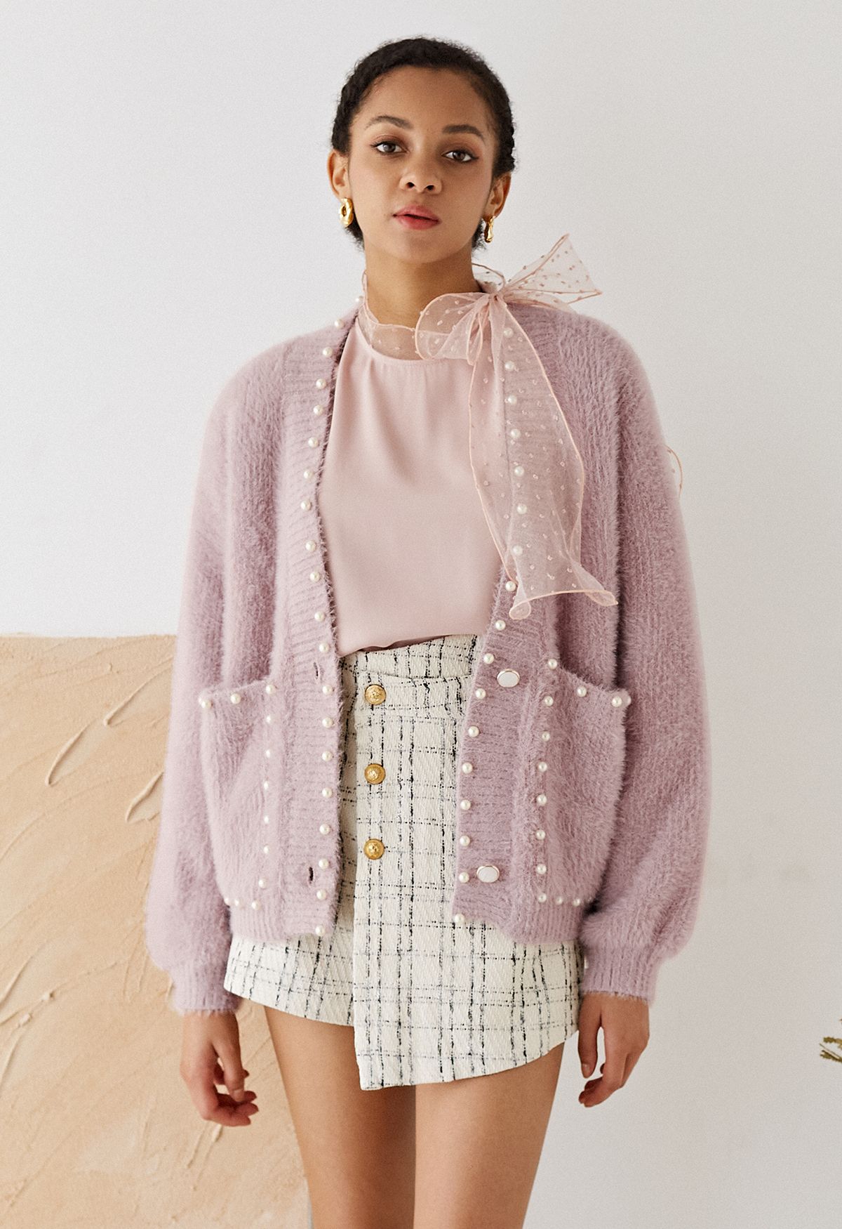 Cardigan en tricot pelucheux avec poches passepoilées en vieux rose