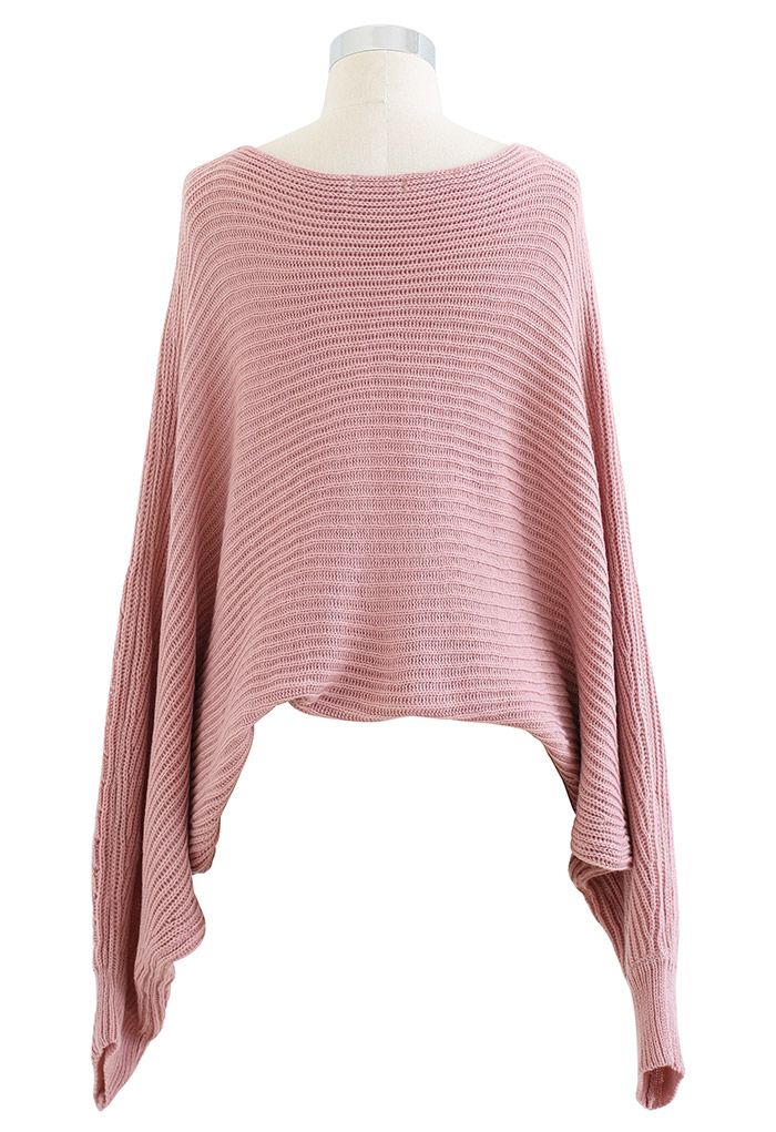 Pull en tricot à manches chauve-souris torsadées sur le devant en rose