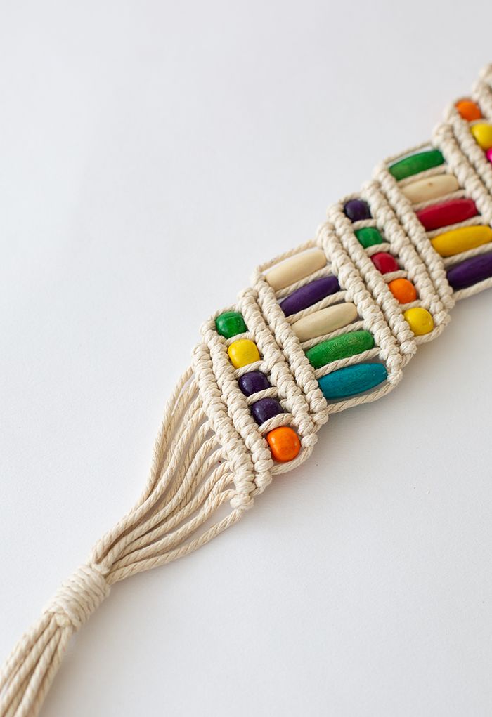 Ceinture tissée en perles de bois colorées en ivoire