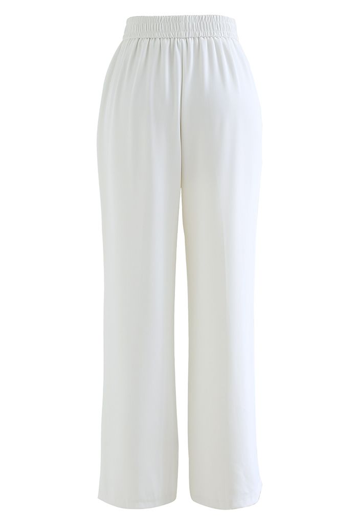 Pantalon à triple coutures et poches droites en blanc