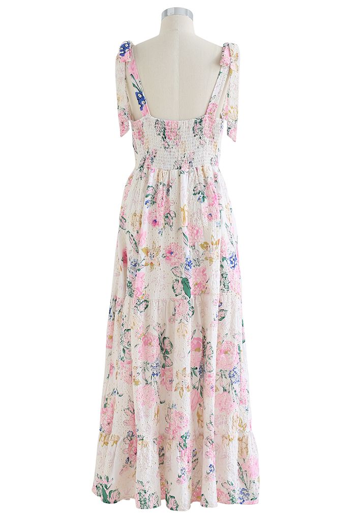 Robe longue rose à œillets brodés de fleurs et bretelles à nouer