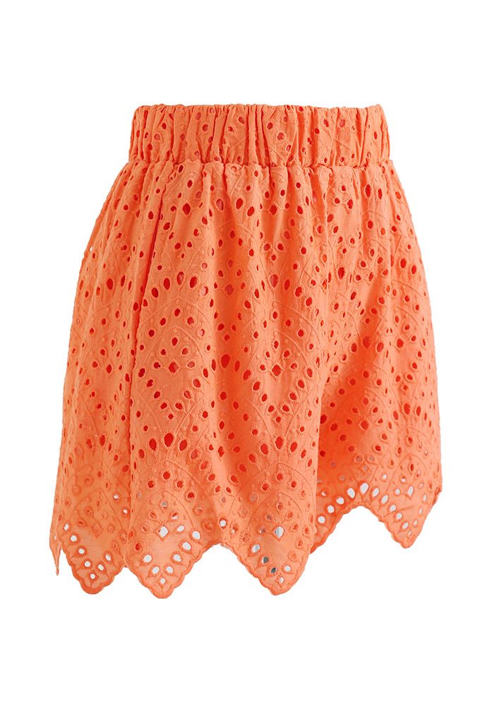 Short à ourlet en zigzag avec œillets en orange