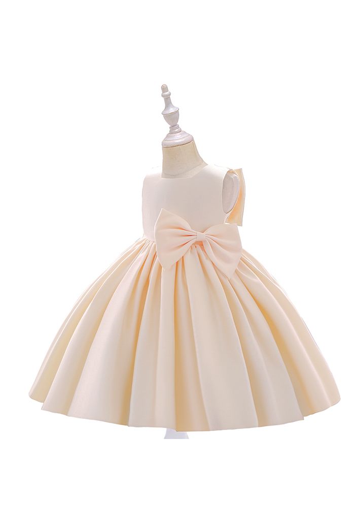 Robe de princesse sans manches à grand nœud dans le dos en crème pour les enfants