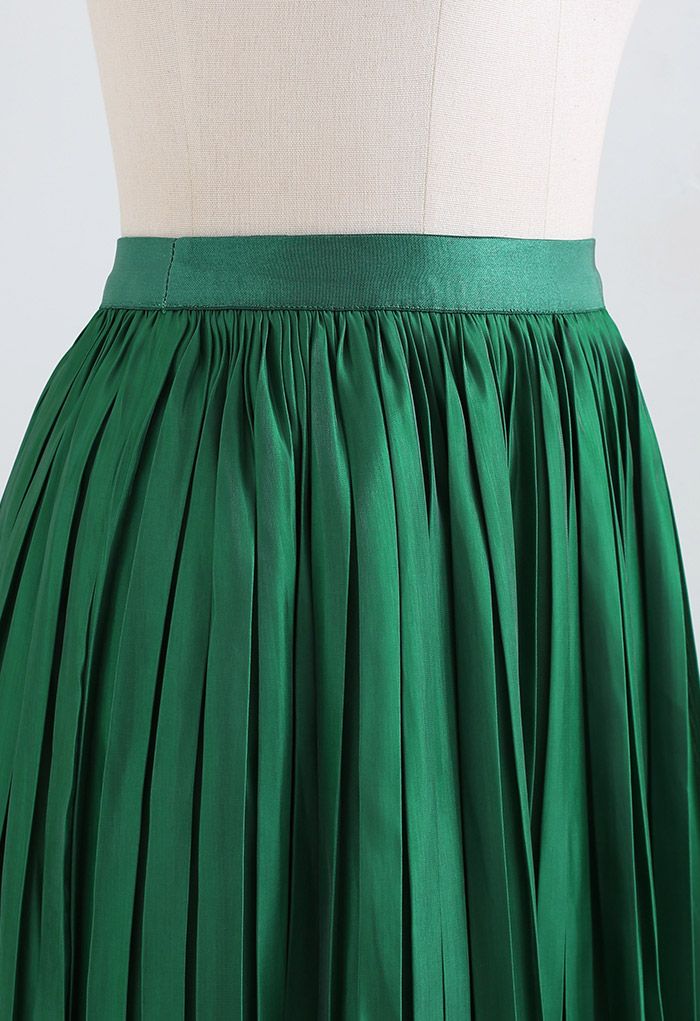Jupe mi-longue plissée à taille élastique scintillante en vert