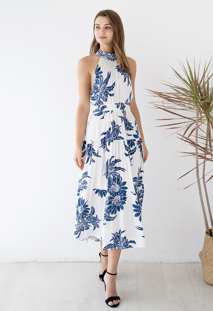 Robe dos nu indigo à fleurs et découpes