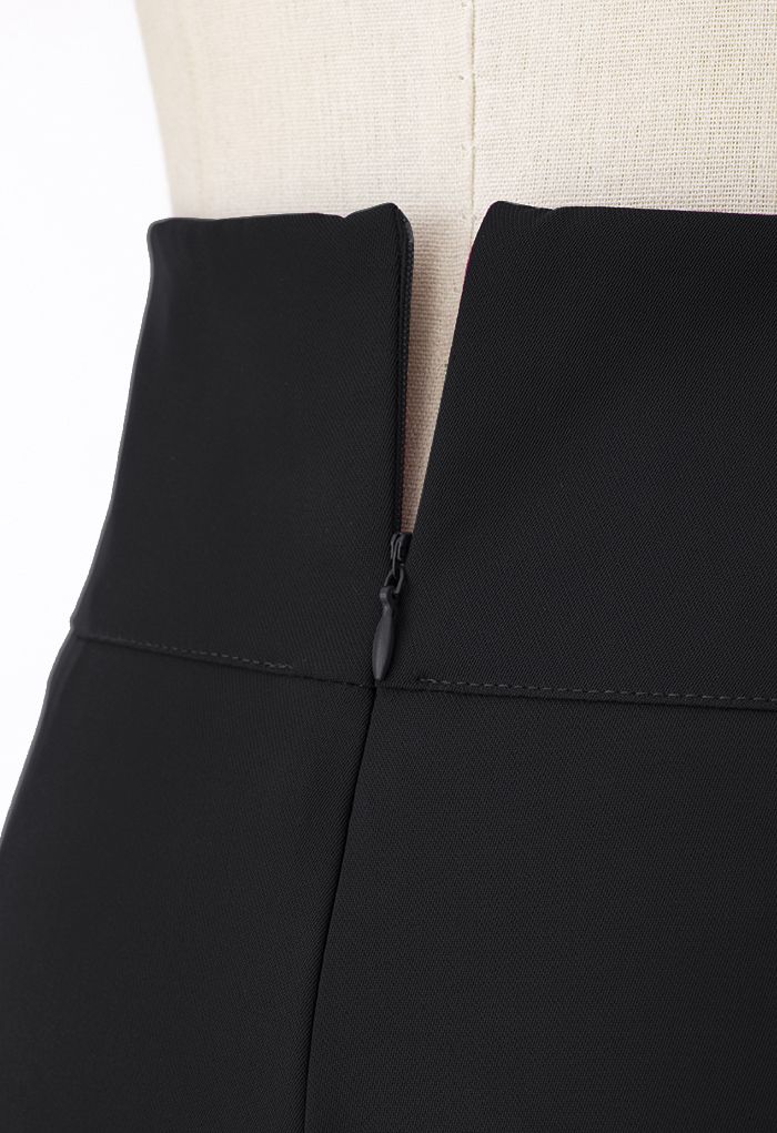 Pantalon large à taille découpée en noir