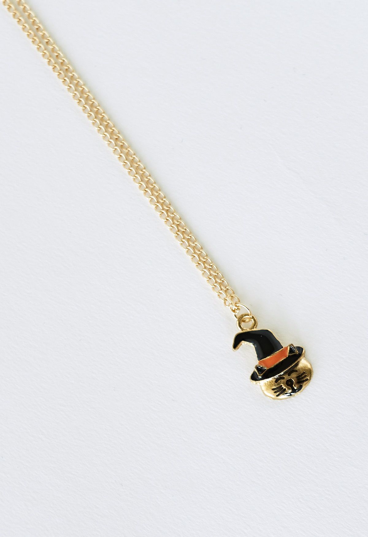 Collier doré chat sorcier