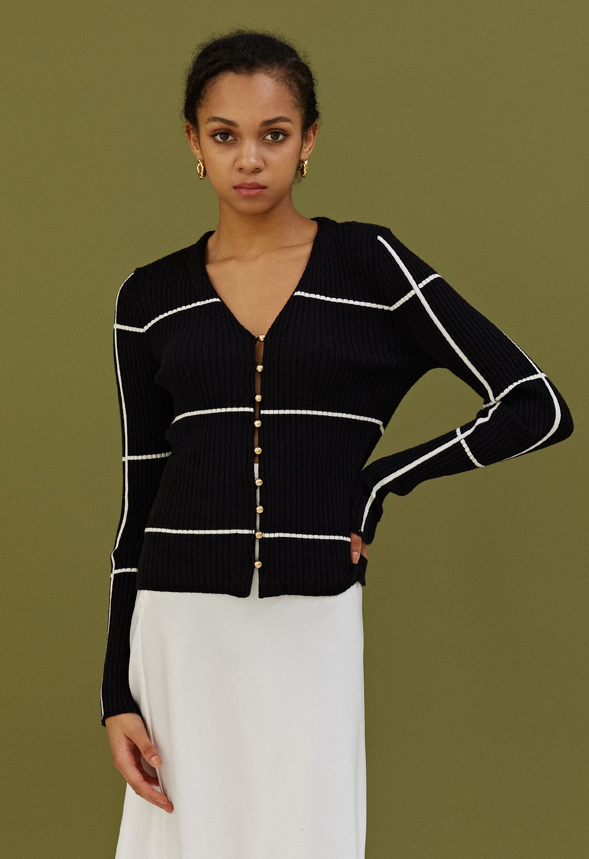 Pull boutonné à encolure en V Grid en noir