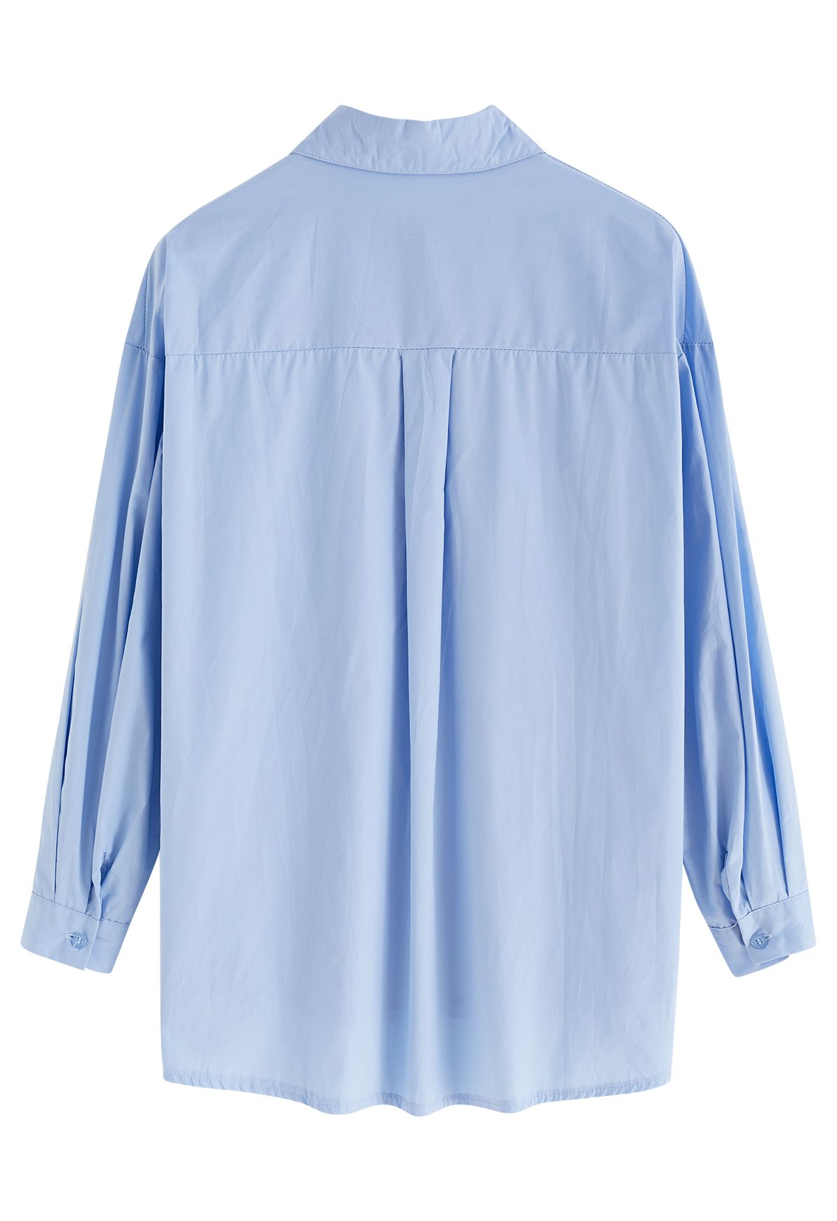 Chemise boutonnée en coton à col pointu en bleu
