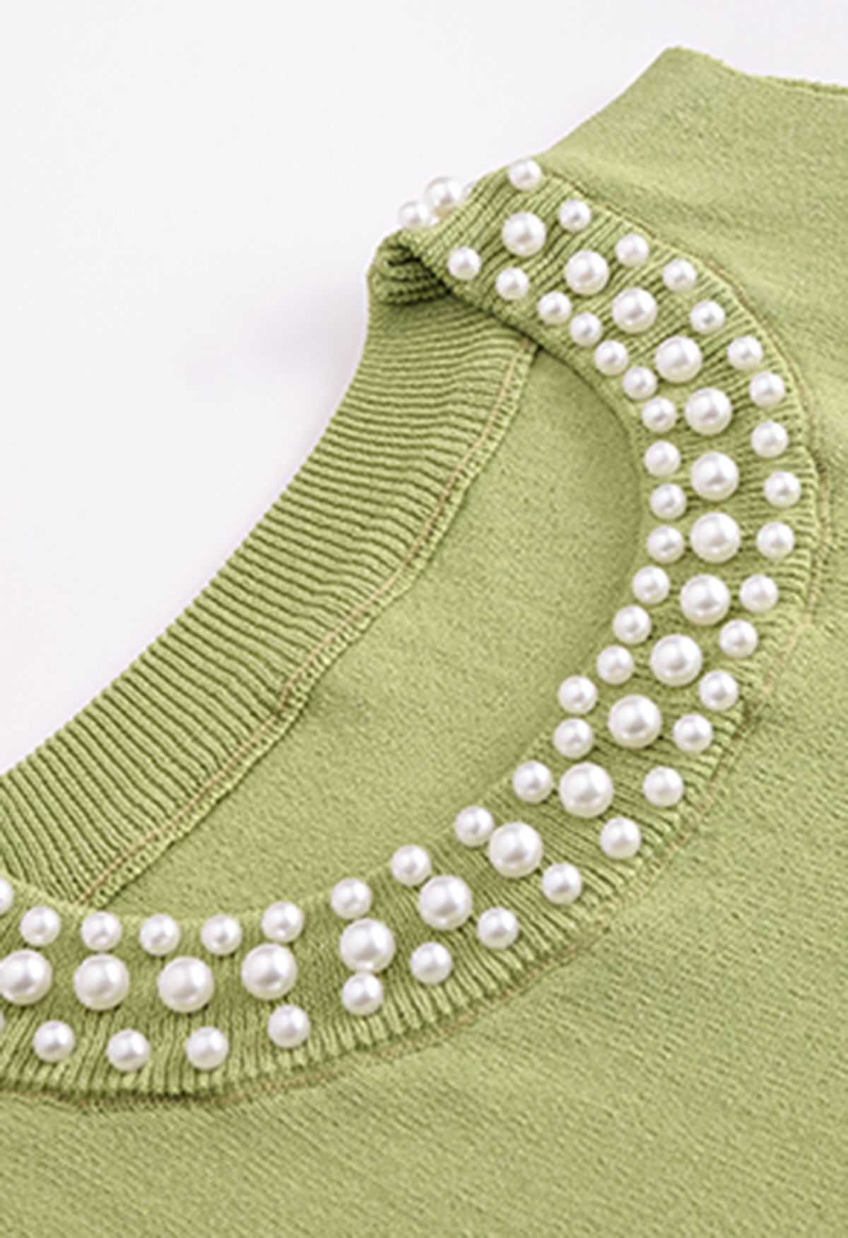 Débardeur en tricot à encolure nacrée en vert