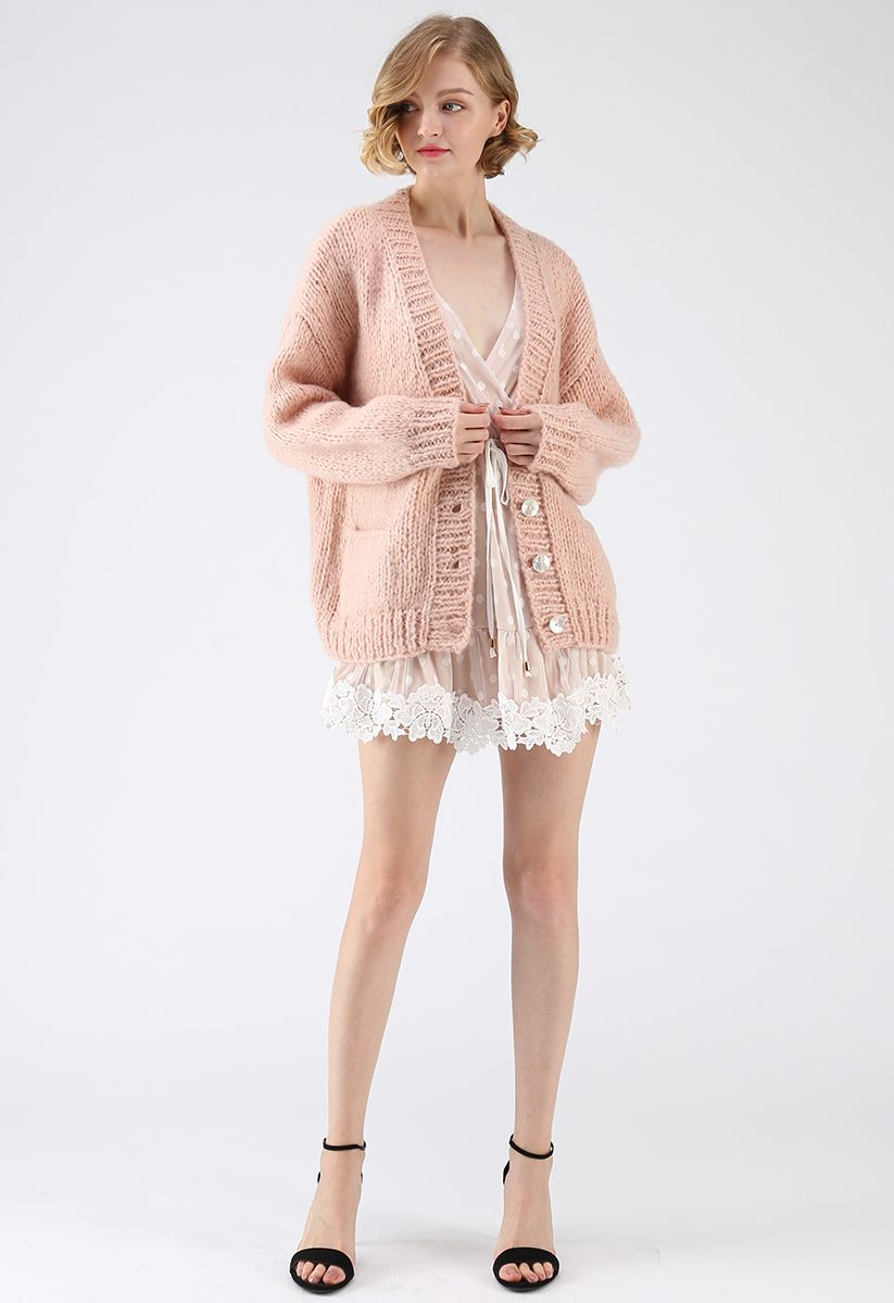 Pause pour le confortable cardigan en tricot à la main Chunky rose