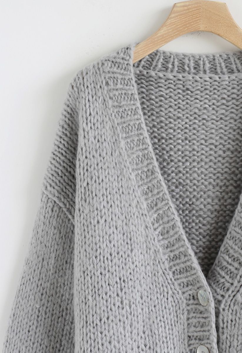 Pause pour le cardigan en tricot à la main confortable Chunky gris