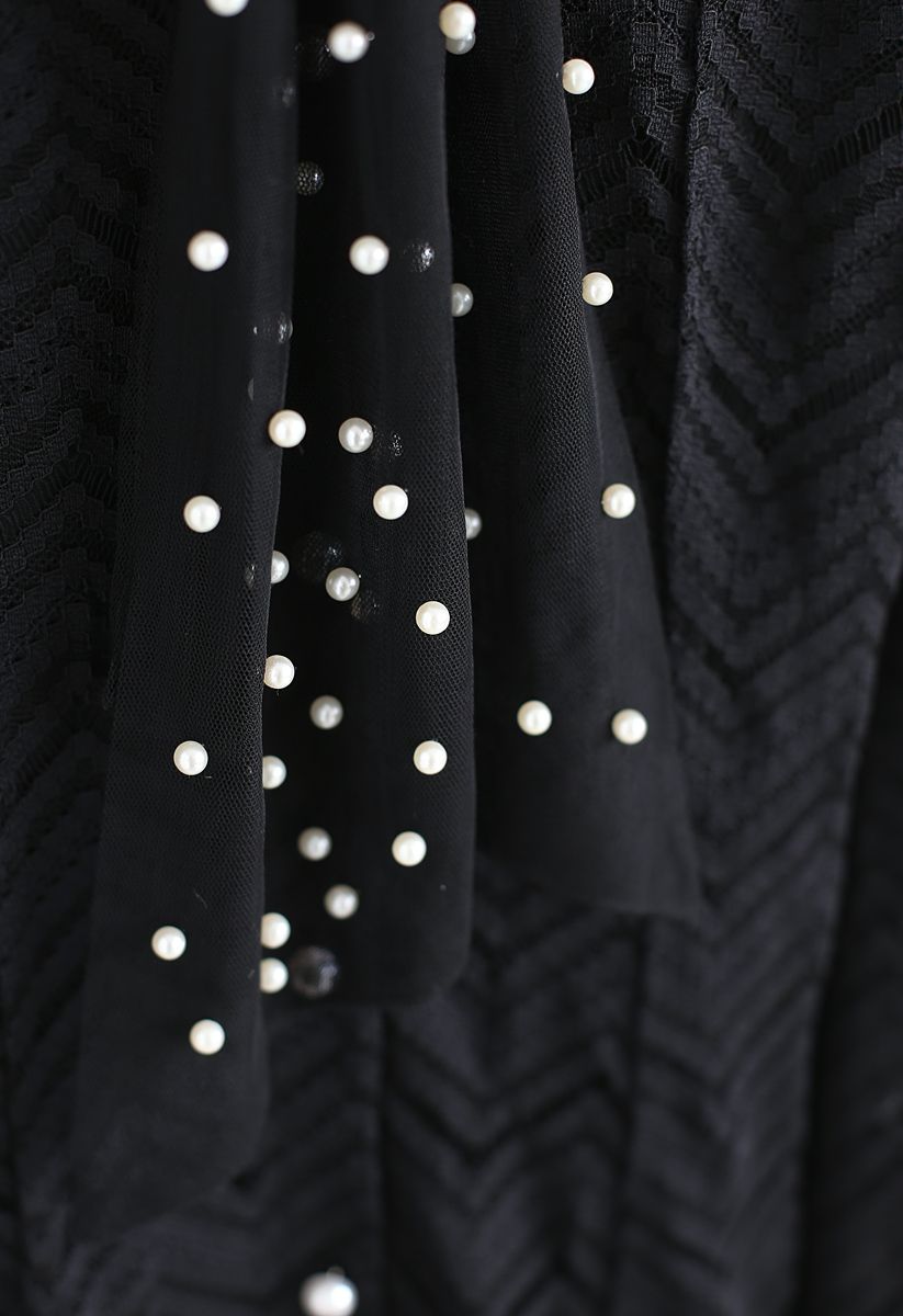 Robe en dentelle avec perles et perles noires