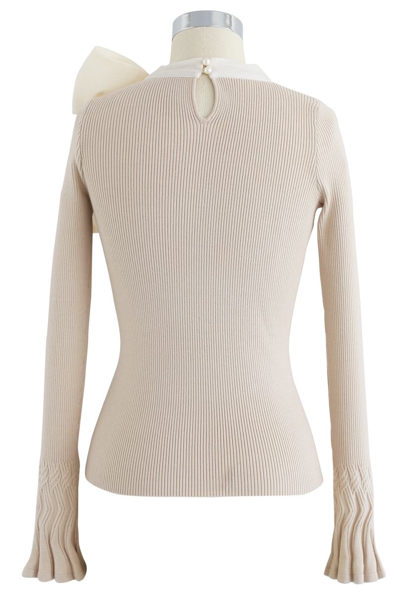 Top en tricot avec nœud beige