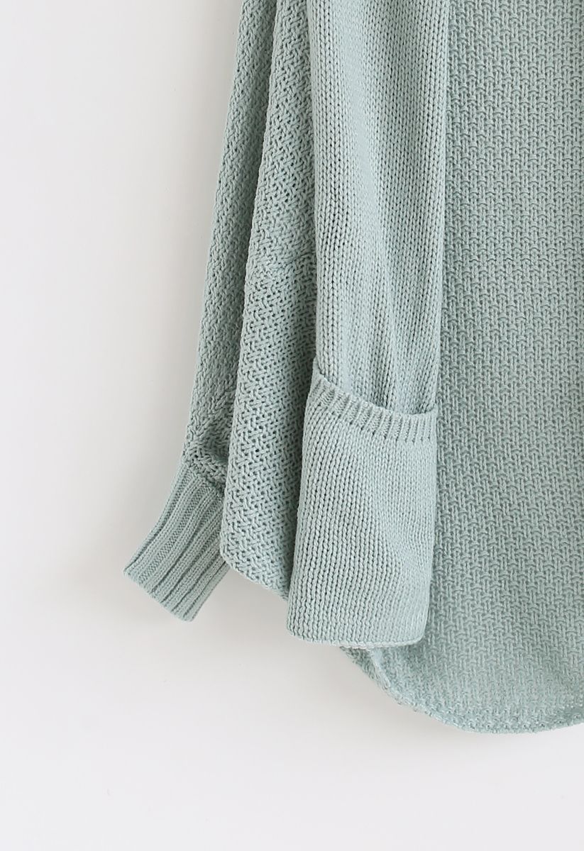 Cardigan en tricot drapé ouvert sur le devant en bleu