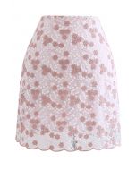 Mini-jupe en maille fleurie brodée