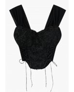 Crop top bustier à lacets fleur 3D en noir